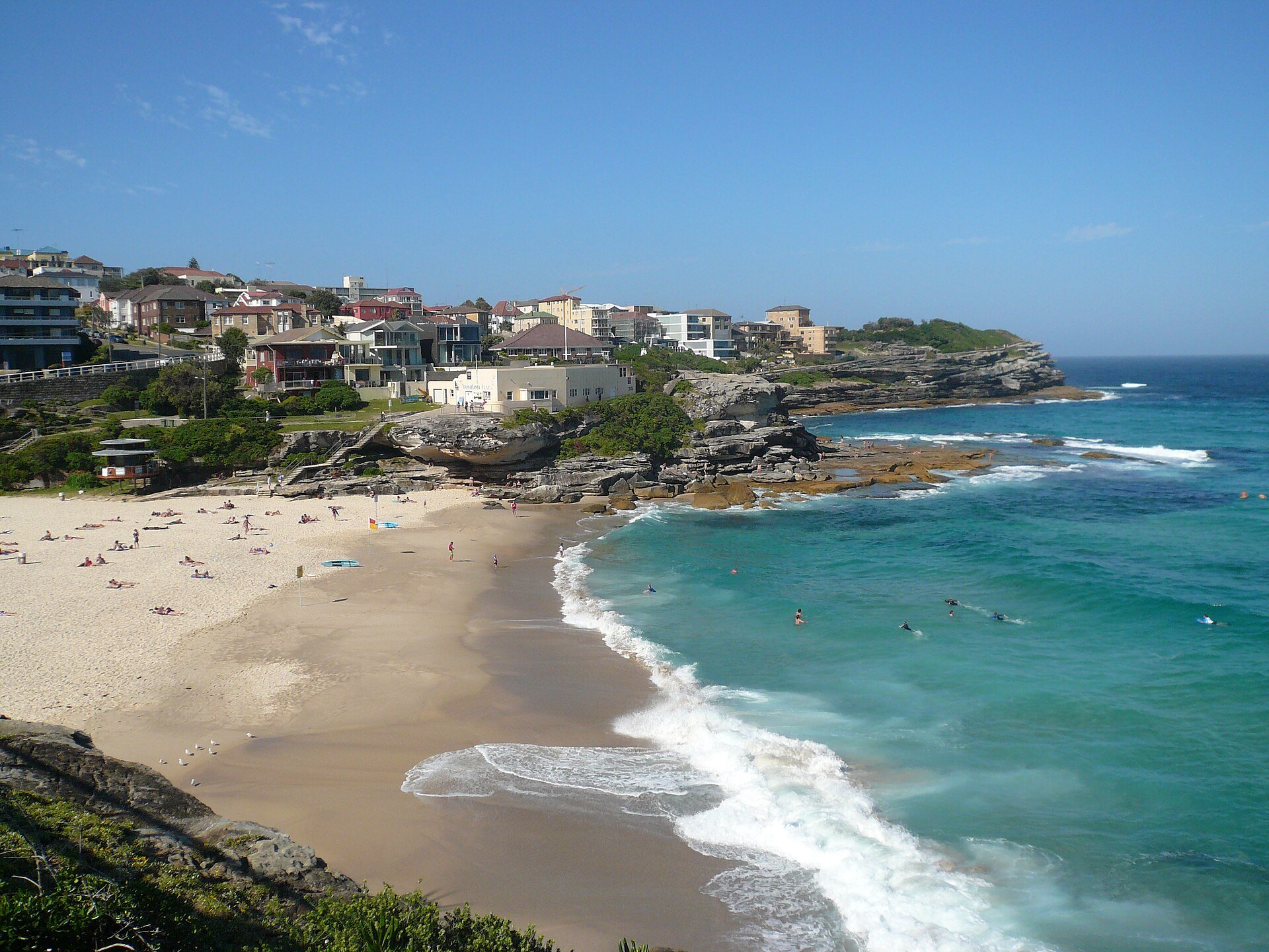 Tamarama Beach from the path above, a small beach between two headlands