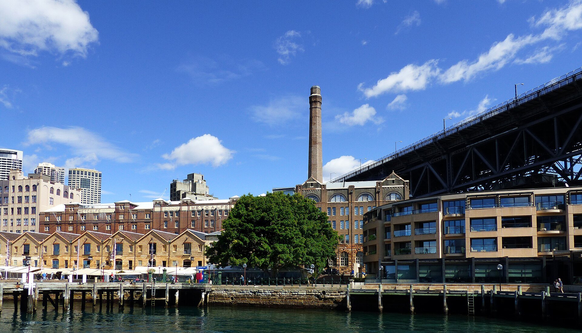 The waterfront at the Rocks with the Harbour Bridge directly overhead