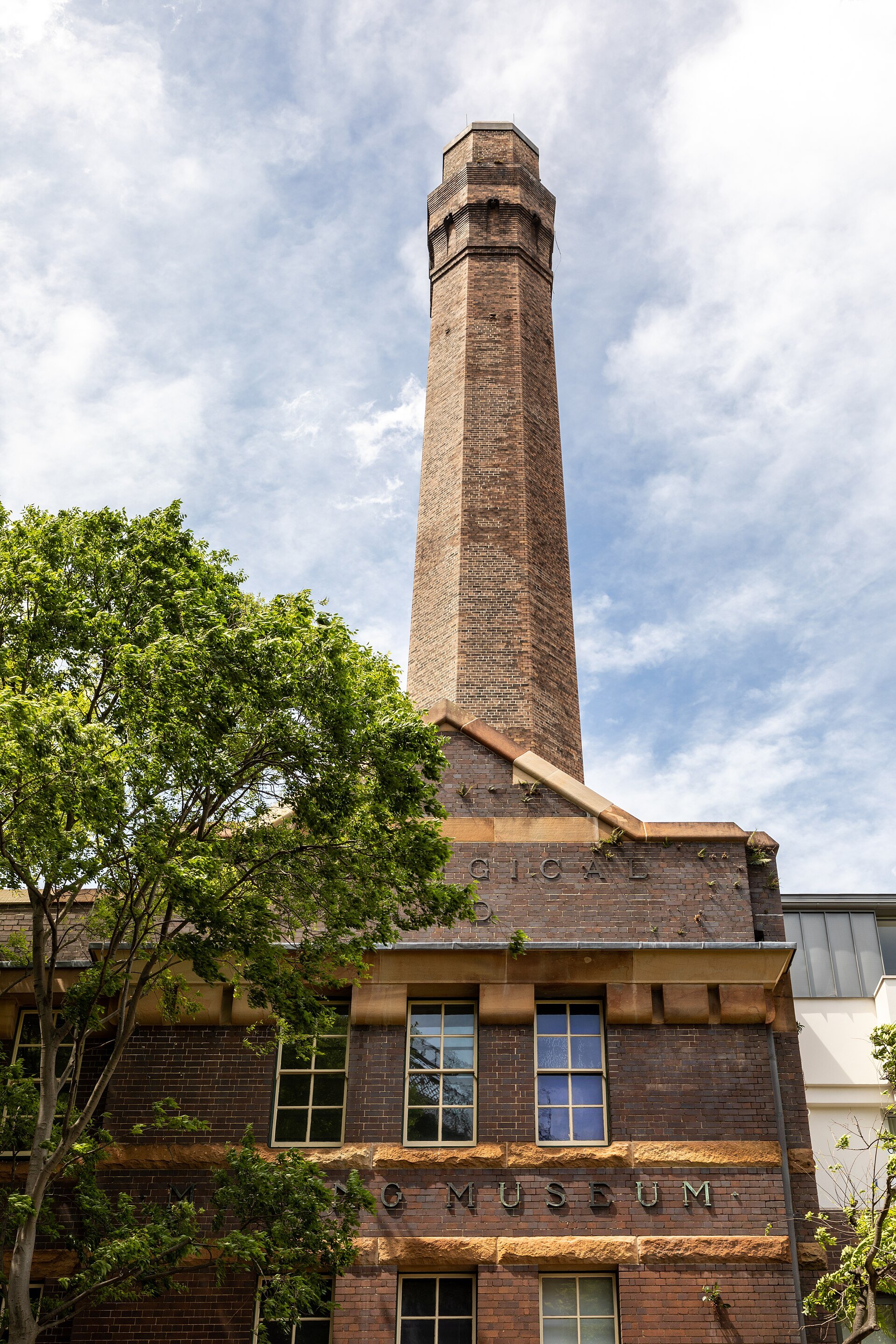 The brick chimney of the old power station standing above the Rocks